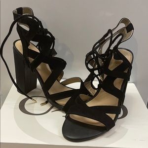 String up, Opened Toed Black Heels